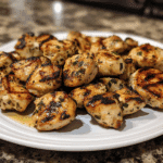 grilled chicken bites plated with dip